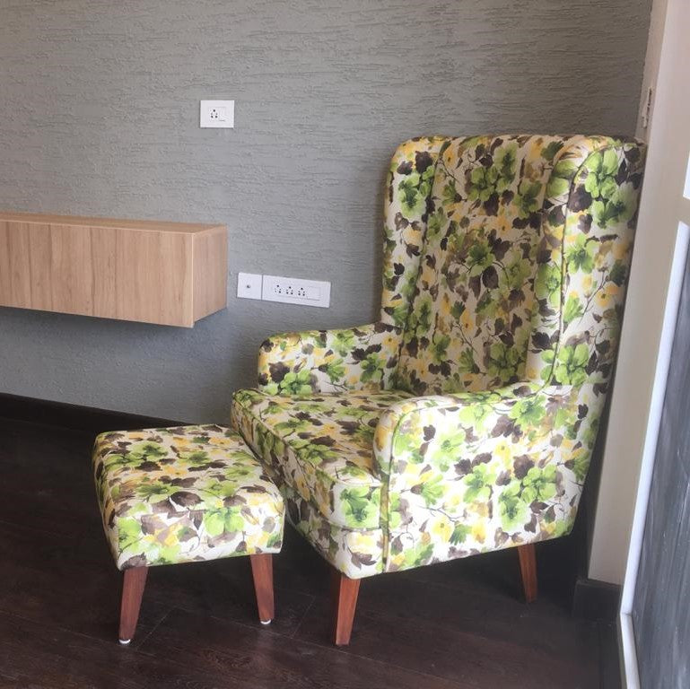 CustHum winged-back chair and ottoman in green forest leaves fabric