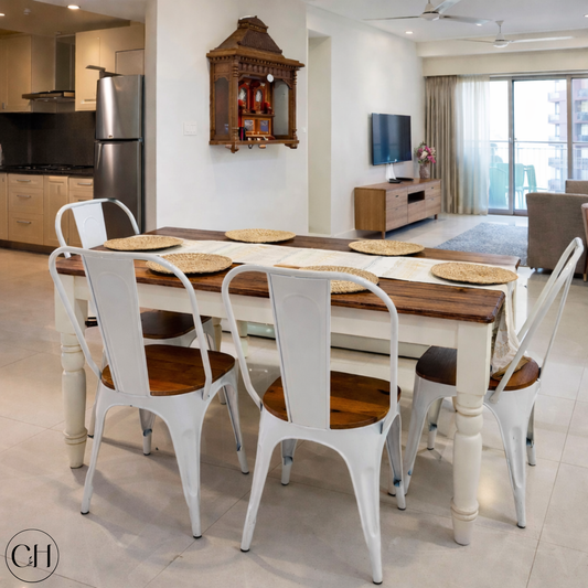 4-seater dining set with wooden table and metal chairs in wood-white tone placed in a modern Indian apartment | CustHum
