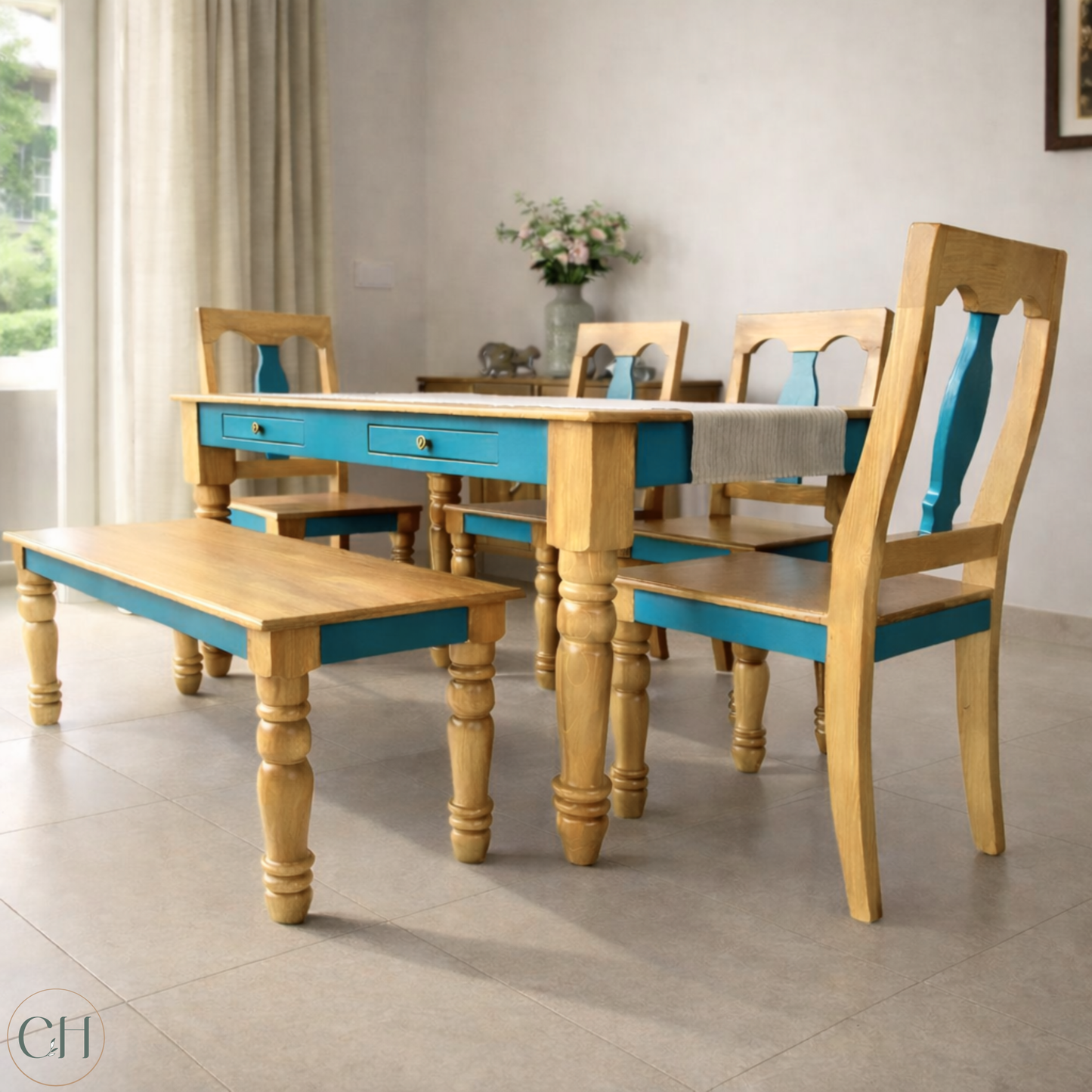 Farmhouse-style dining set with wooden table and chairs, featuring a mix of beechwood tone and teal, in a well-lit room | CUSTHUM
