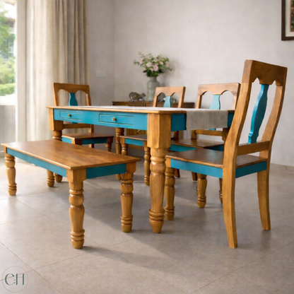 Farmhouse-style dining set with wooden table and chairs, featuring a mix of light brown and teal, in a well-lit room | CUSTHUM