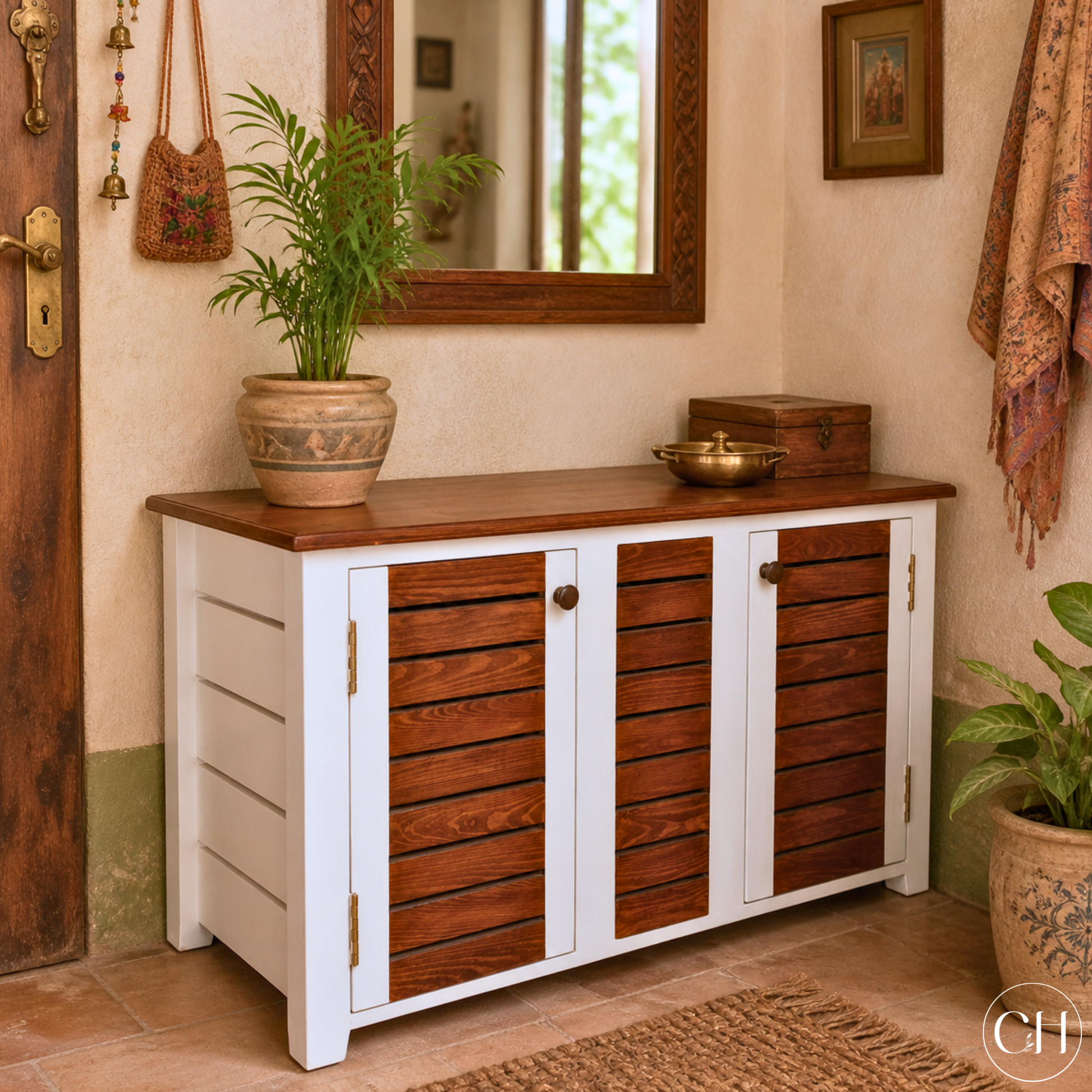 Shoe cabinet in white-and-wood tone with slatted door panels placed in an Indian apartment entryway - CustHum