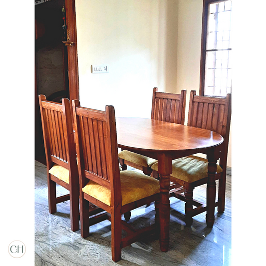 CustHum-Marigold-oval dining table set with 4 chairs, upholstery on seat, handturned legs (dining room view)