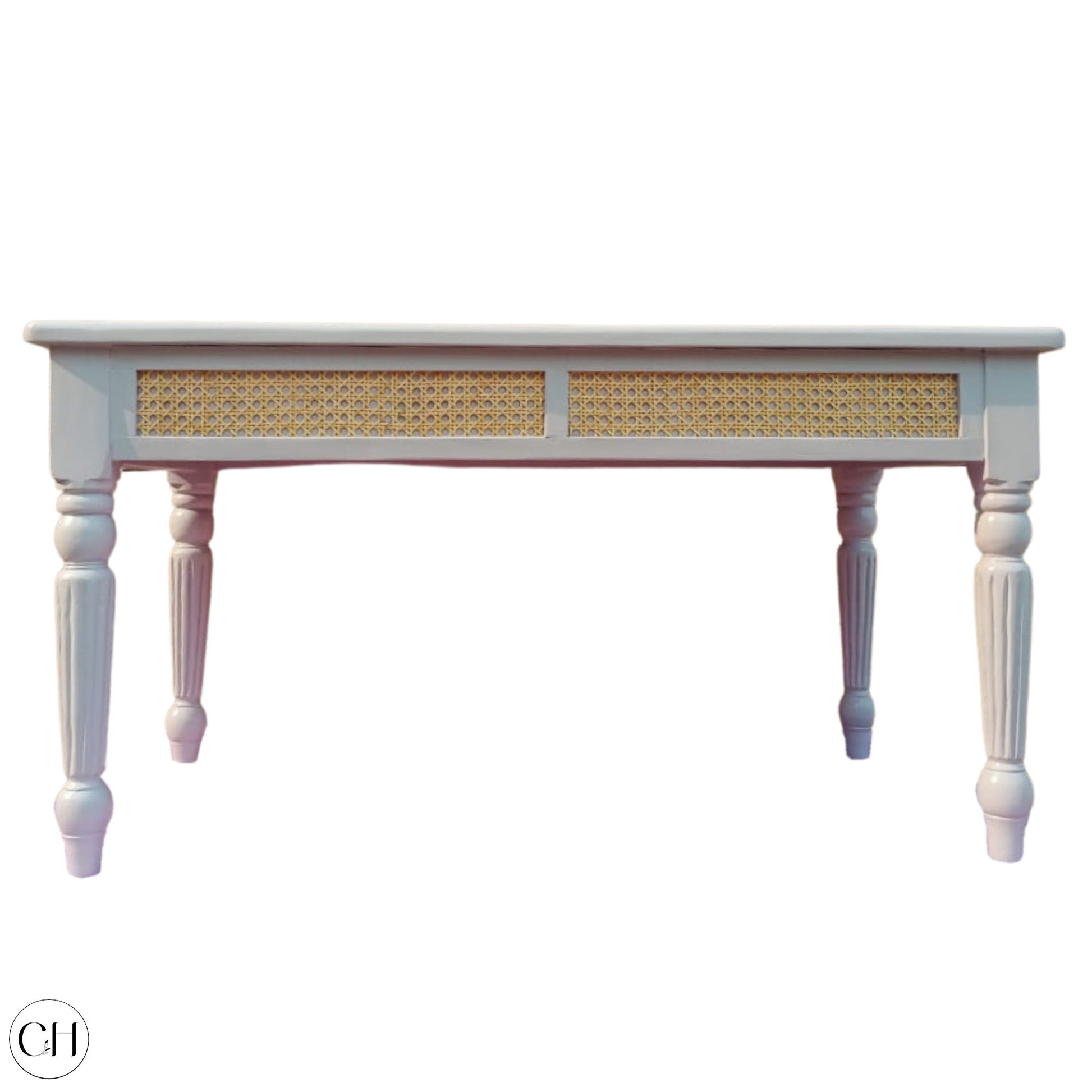 CustHum - Coffee table with glossy laminated top, rattan accent on apron, turned legs (front view, white background)